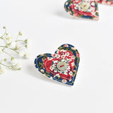 Sewn heart brooch, embroidered fabric heart badge handmade by Stitch Galore