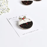 Embroidered fabric Christmas pudding pin badge by Stitch Galore