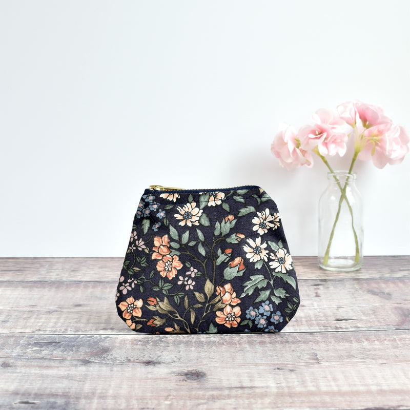 Coin purse made from dark blue vintage floral fabric handmade by Stitch Galore