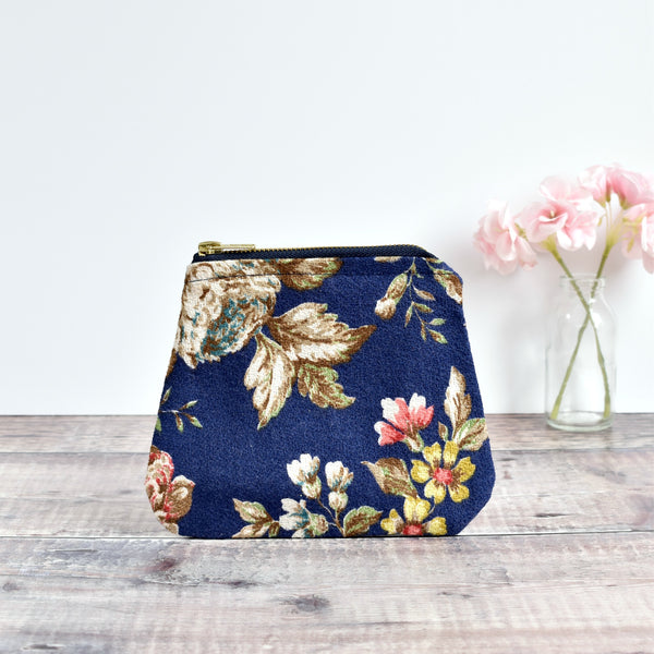 Zip purse, makeup bag made from blue barkcloth vintage floral fabric handmade by Stitch Galore