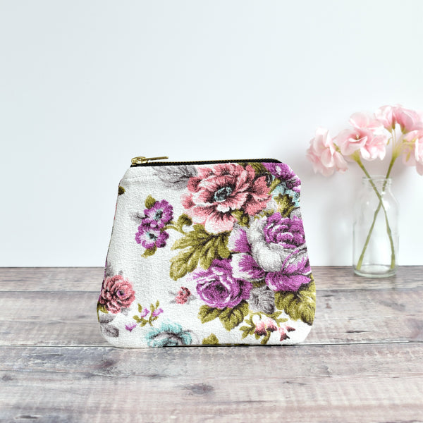 Zip purse, makeup bag made from white barkcloth pink and purple vintage floral fabric handmade by Stitch Galore