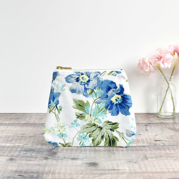 Zip purse, makeup bag made from white blue floral vintage fabric handmade by Stitch Galore