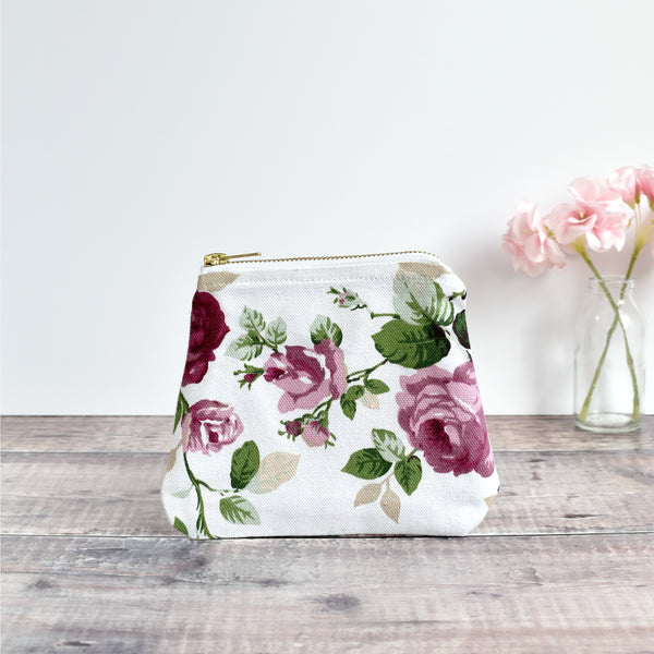 Zip purse, makeup bag made from white pink floral vintage fabric handmade by Stitch Galore