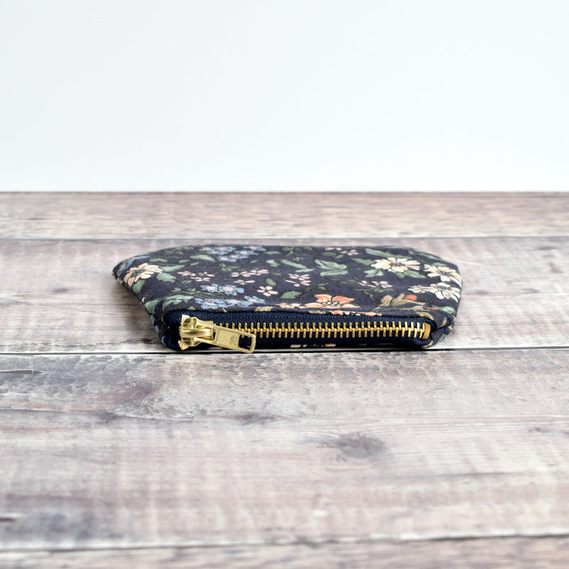 Coin purse made from dark blue vintage floral fabric handmade by Stitch Galore
