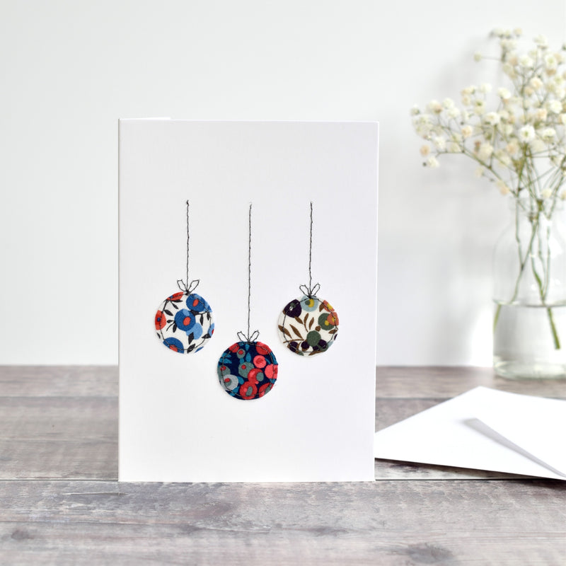 sewn Christmas card with liberty fabric baubles handmade by stitch galore