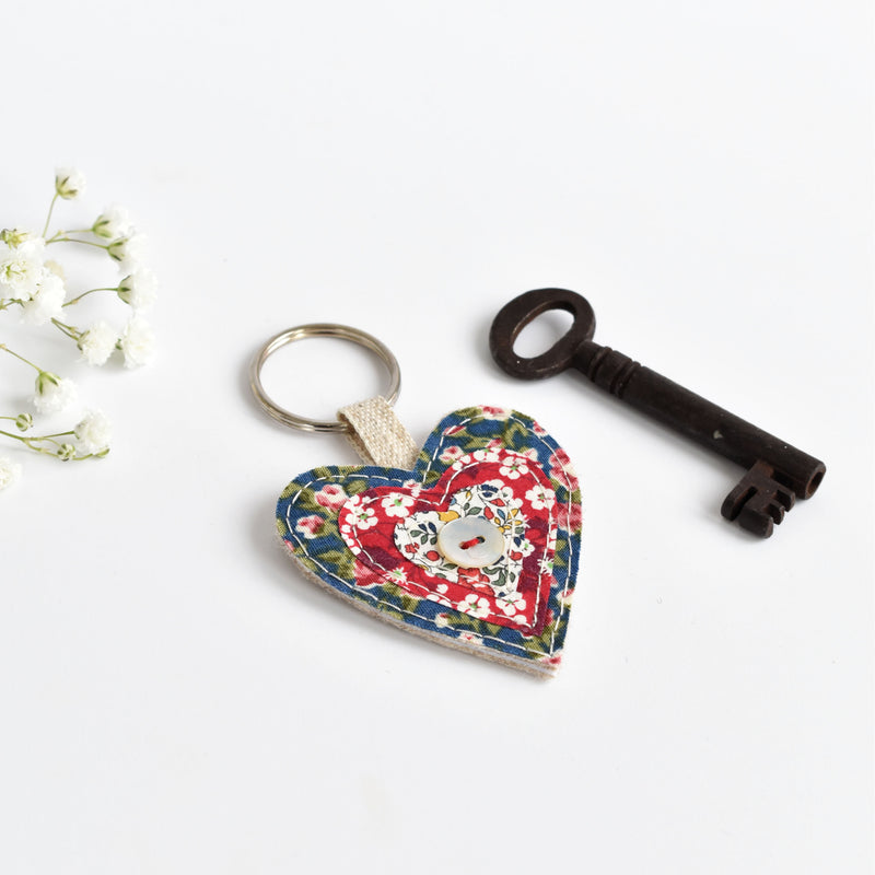 Embroidered fabric heart keyring, sewn heart keychain with blue floral fabric handmade by Stitch Galore