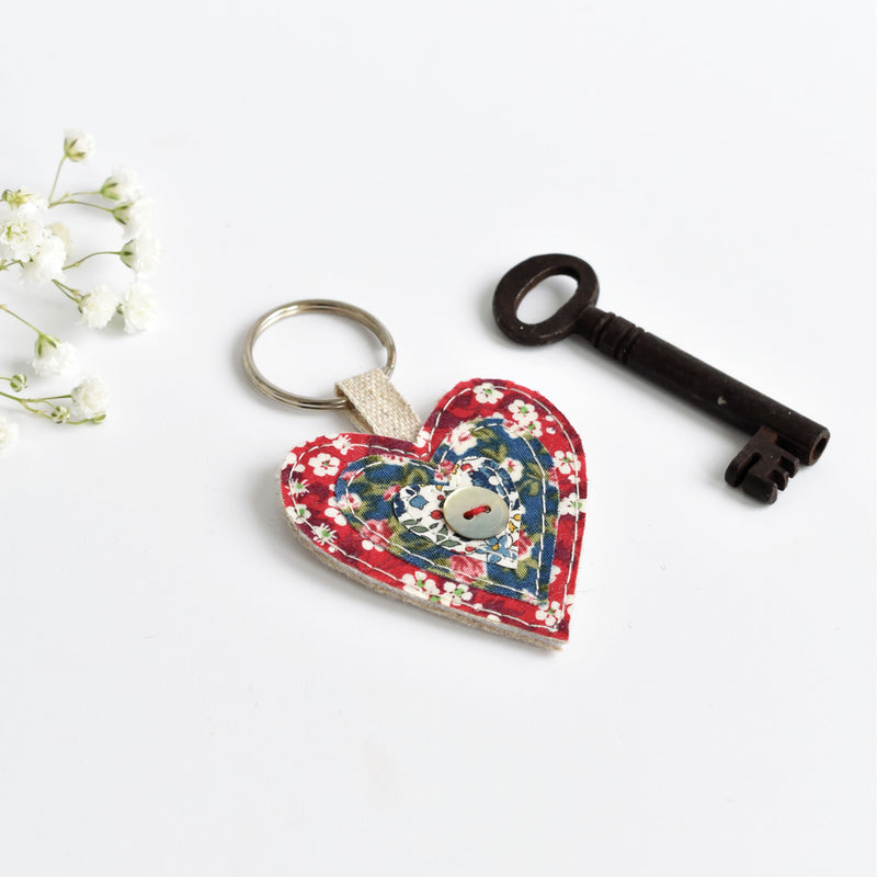 Embroidered fabric heart keyring, sewn heart keychain with red Liberty fabric handmade by Stitch Galore 