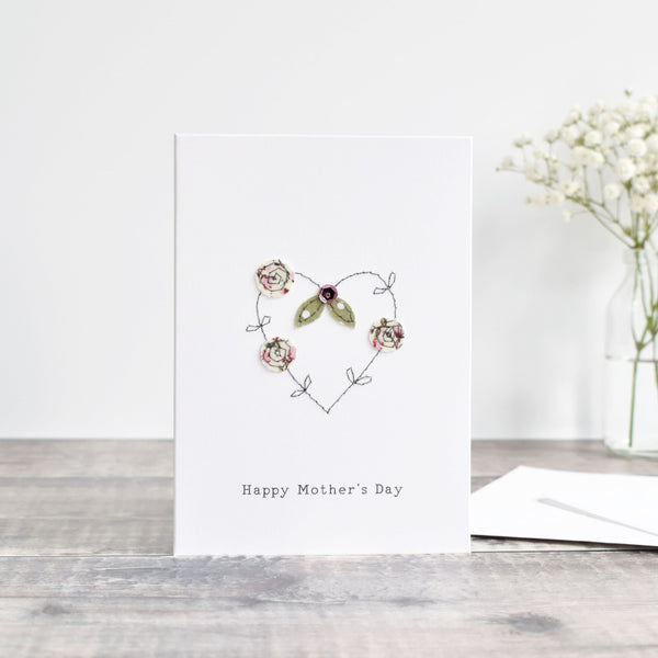 Happy Mother’s day card  with an embroidered heart and flowers handmade by stitch galore