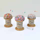 Pincushion, sewing gift made with a wooden cotton reel and Liberty fabric handmade by Stitch Galore